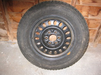 4 STUDDED 17 INCH WINTER TIRES. 245/65 R17