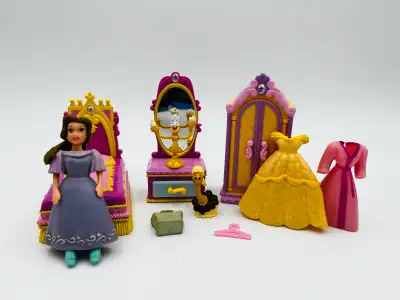 Disney's Belle Polly Pocket Doll Belle Polly pocket doll with clothing and bedroom furniture. The cl...
