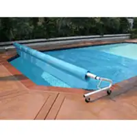 Dérouleur de toile solaire pour piscine creusée