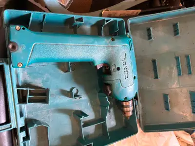 Makita 9.6 volt battery operated drill with case, View more