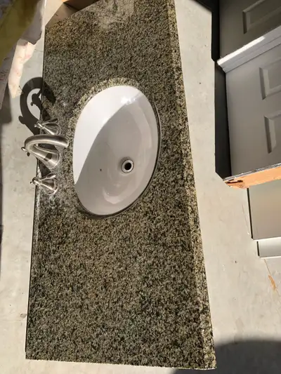 Bathroom thick 1.5” Granite marble countertop 49”wide 22” depth,no faucet ,the sink is small slightl...