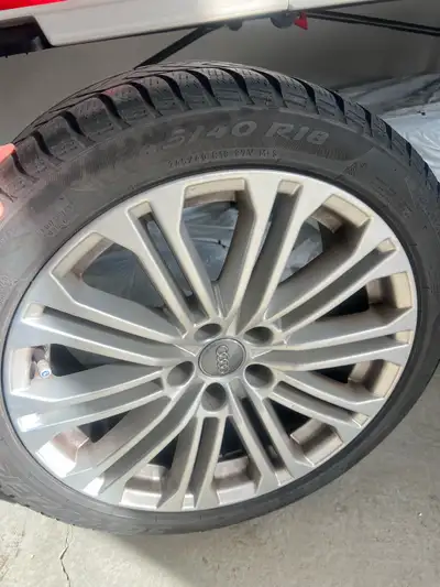 Offering a set of used Audi winter tires and Rims bought at Audi Vaughan dealership, size 245/40 R18...