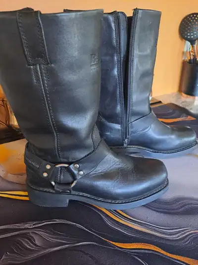 These are Bates waterproof black leather biker boots, providing protection and comfort on the road....