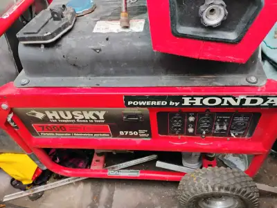 For sale is a used Husky 7000 portable generator, powered by a reliable Honda engine, capable of del...