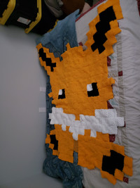 Jolteon themed knitted blanket 