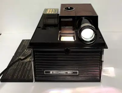 Vintage Bell & Howell 987 Slide Cube Projector, made in Canada, tested, $95; Contact PCTRUST Compute...
