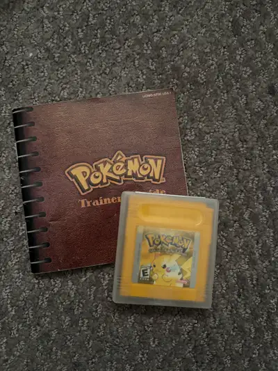 Pokémon Yellow with case and manual battery saves, View more
