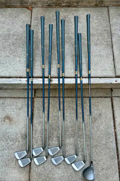 Graphite and titanium set of golf clubs. Right handed. Campbell brand - Canadian made! Consists of d...