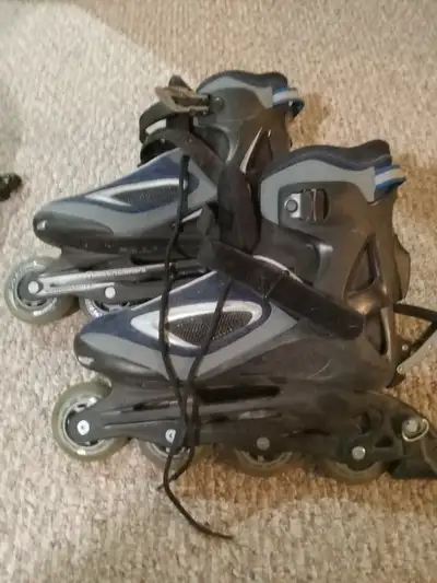 Roller blades and helmet, View more