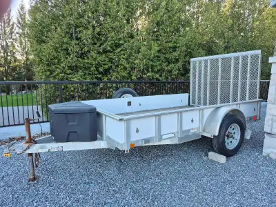 Good condition 3500lb single axle Loading ramp Pressure treated wood deck Tiedown anchors Trailer to...