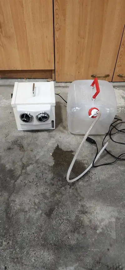 12 volt evaporative air conditioner. Www.swampy.net for more info. Fill with water, plug into a 12 v...