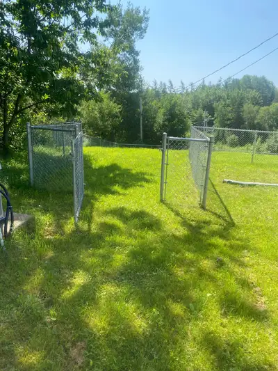 Approx. 275” of galvanized steel chain link fencing. One gate included. Buyer to remove.