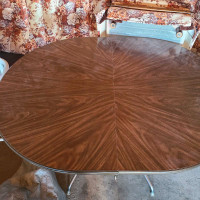 Table with extension leaf, 6 swivel chairs. 