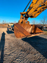 Cat 316  excavator ditching bucket