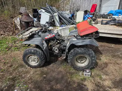 Selling a 1990 yamaha big bear 350. Got on trade and not able to fix. Needs front driveshaft and has...