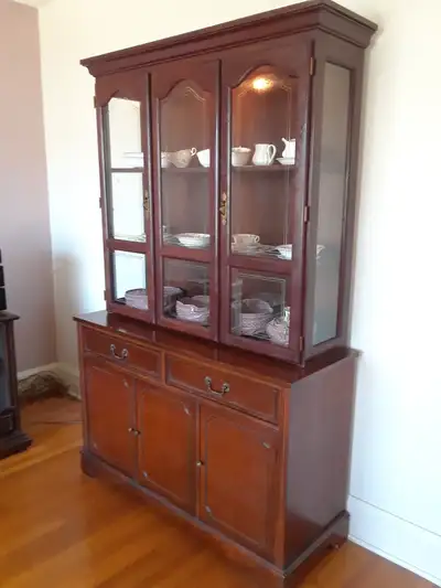 China cabinet with light. Two piece set. $250 Seller will respond to phone calls only. No texts or e...