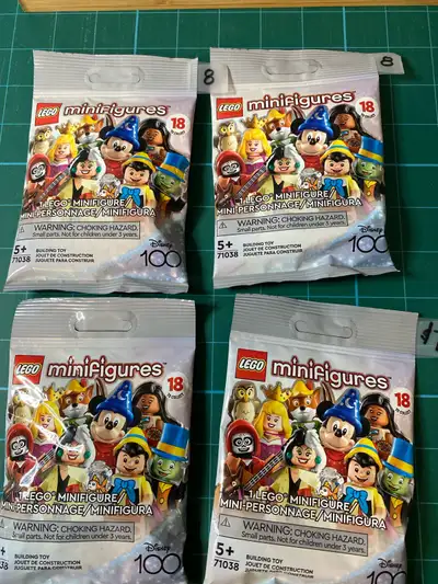 Disney 100 Four bags Sealed/Unopened Pinocchio (2) Oswald Rabbit Mulan (Cannot 100% guarantee that’s...