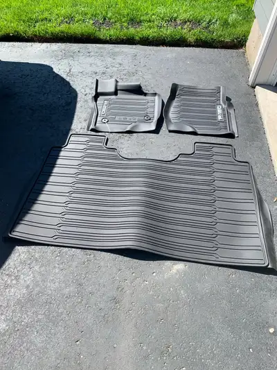 -Ford F150 OEM rubber floor mats. -Weather tech style. -Brand new. Never used. Still has tag on them...