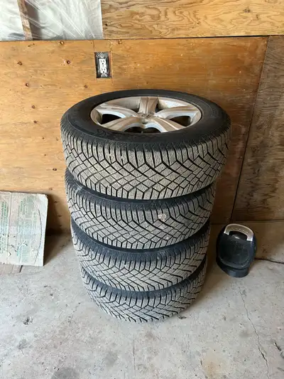 4 Winter tires on Lexus alloy rims 235/65 R 17 Continental tires 5x 114.3 Bolt pattern Only used for...