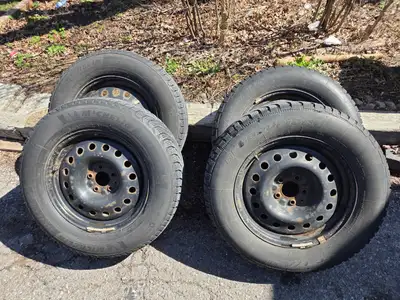 Selling a set of 4 winter tires mounted on steel rims. Size: 235/65R17 Includes: - 2 Michelin X-Ice...