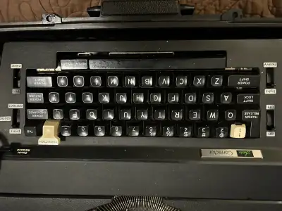 Vintage electric typewriter, View more