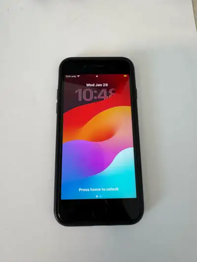 Black iPhone SE with 128GB storage. Has a cracked back case but functions properly. Battery health i...