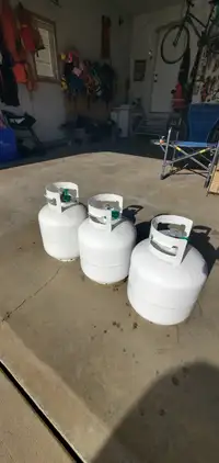 Full and certified 20 lb propane tanks.