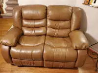 Leather couches and table set (Reduced Price Must go fast)