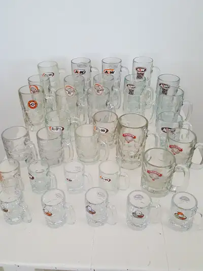29 A&W mugs and 3 Champs mugs in nice condition. No cracks or chips. All 32 for $240. Pickup in Mord...