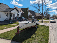 Turn key boat motor and trailer