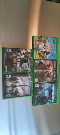 Xbox One games in fantastic shape.  One still in package