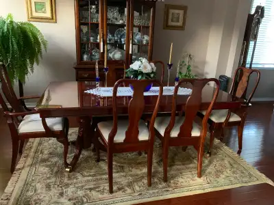 Dining table and 6 chairs with hutch., View more