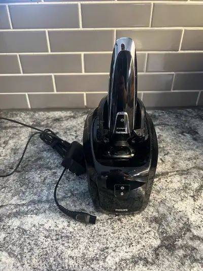 Philips sensitouch 3D shaver, this is a great shaver. Has the self cleaning tank which you can buy t...