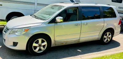 Selling my family's trusty silver 2010 Volkswagen Routan SEL fully loaded minivan, perfect for hauli...