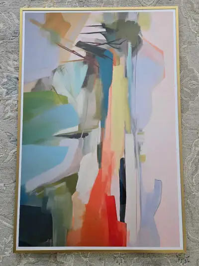 Add a touch of modern elegance to your home with this abstract framed artwork, showcasing a blend of...