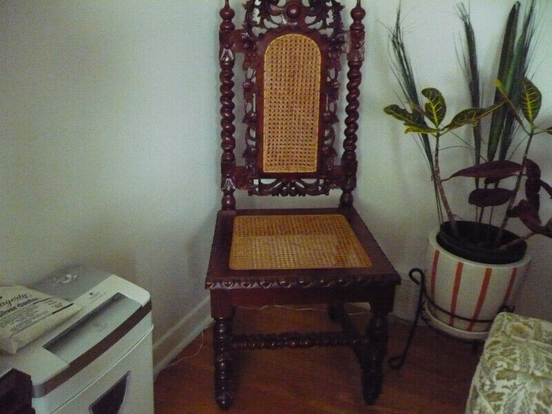 CARVED KINGS CHAIR WITH RATTAN SEATING IN EXCELLENT CONDITION Chairs