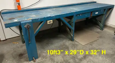 Work bench with vise and 2 drawers, and electrical outlet, View more