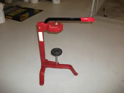 Upright Wine Corker. Sits on the floor. Adjustable to fit many sizes of bottles.