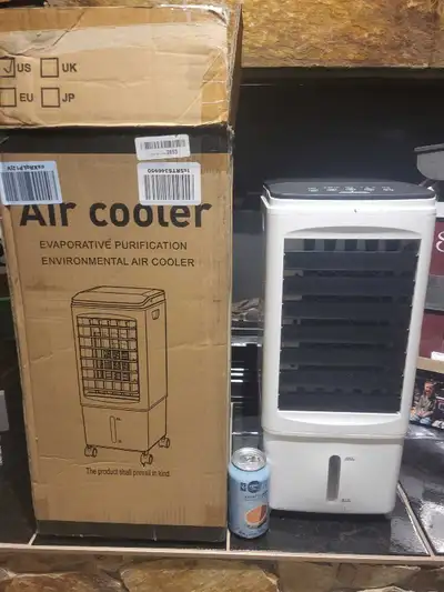 Keep cool this summer with this evaporative air cooler! This unit is new in the box, featuring evapo...