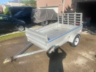 2020 West Brooke Utility Trailor 5x8. Front folds down for extra storage. Rear folds down to drive i...