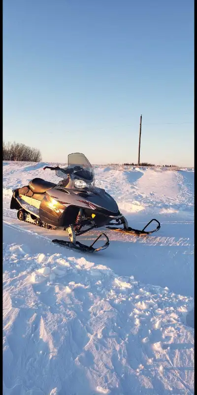 2010 IQ 600 works great electric start reverse 4000 miles looking to trade for quad or dirt bike may...