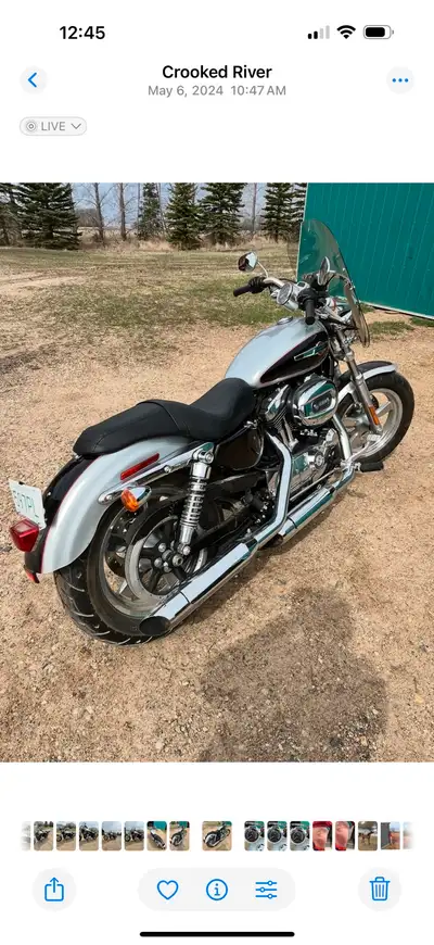 Cruising on this Harley Davidson is like riding a silver bullet through the countryside! This used m...