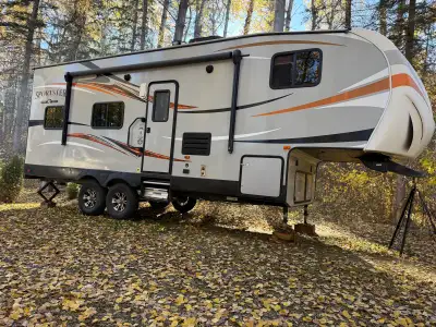 Adventure-ready and well cared for KZ Sportster 260TH (26ft) toy hauler fifth wheel for sale. Custom...