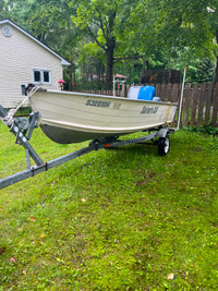 14 ft Boat motor and trailer