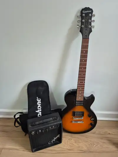 Lightly used electric guitar. Amp comes with all necessary cords. Bag and strap included.