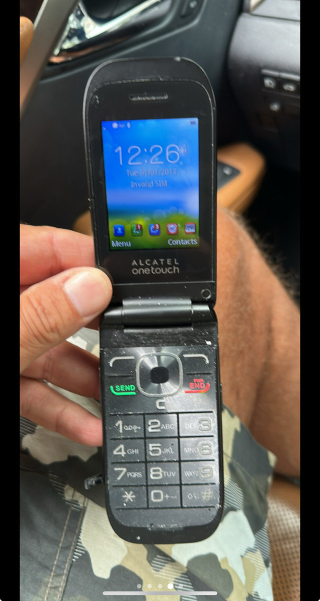 Cellphone with charger  in Cell Phones in Markham / York Region