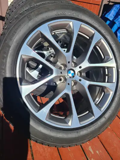 BMW X5 OEM rims equipped with NEW Michelin X-Ice SUV tires . Size 275 45 20. The set fits for BMW X5...