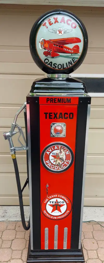 THIS IS A 12 GUN LOCKER DONE UP AS A TEXACO GAS PUMP, View more