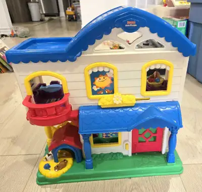 Fisher-Price Little People House that offers interactive play with sounds and activities. The house...