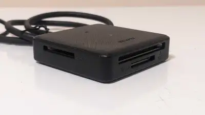 This is a used black Benfei card reader that supports SD, CF, TF and MS/MS2 card formats and connect...